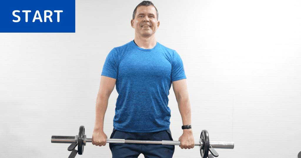 バーベルを持ったシュラッグのスタート姿勢